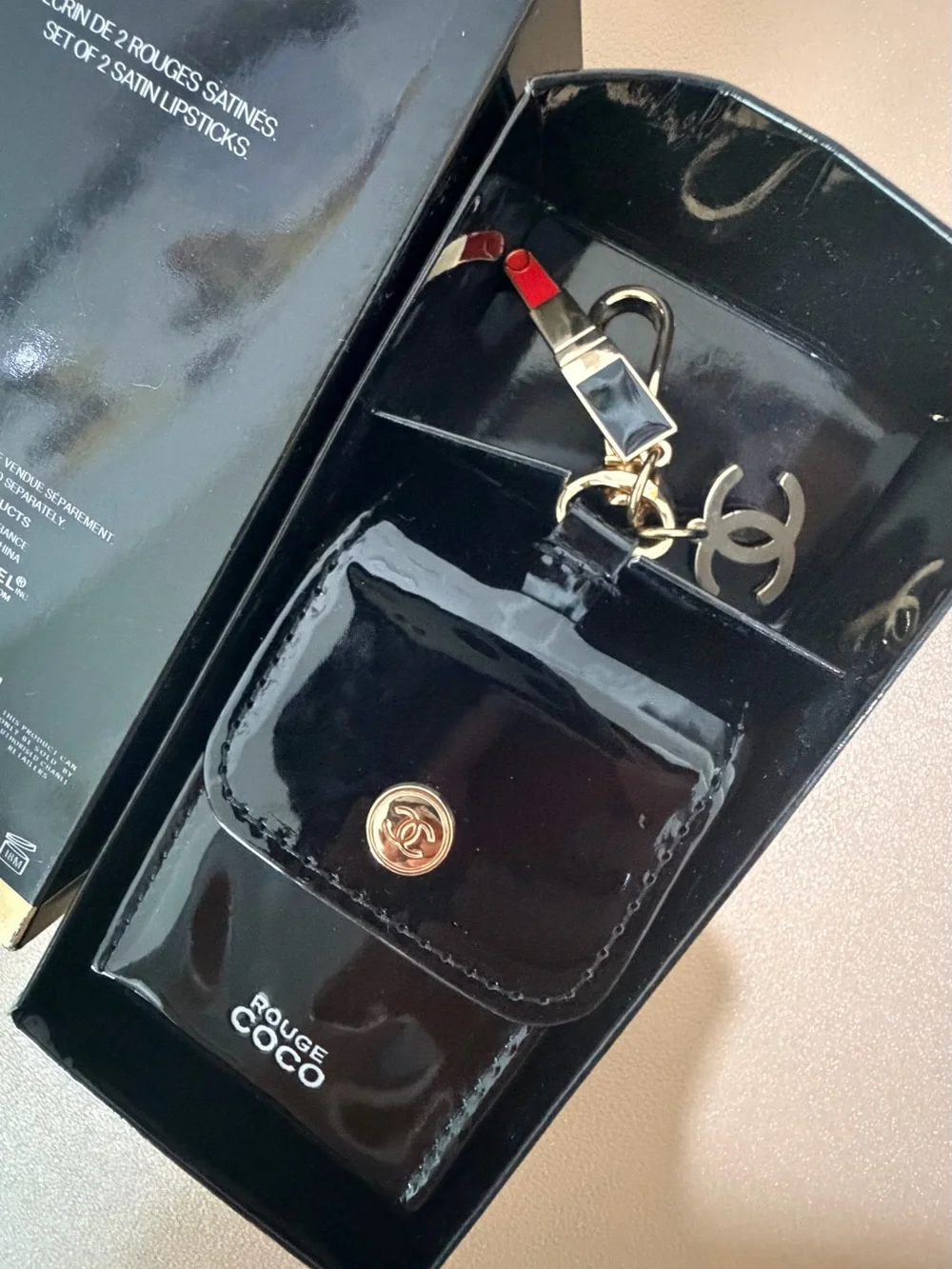 CHANEL Black Patent Rouge Coco Lipstick Holder with Gold Hardware